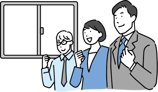 男性二人と女性一人がガッツポーズをしている様子